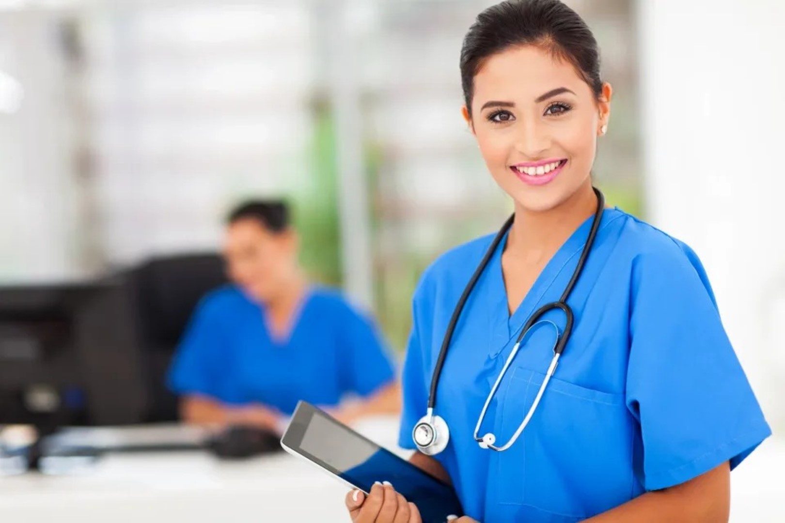 Medical provider performing a routine primary care examination